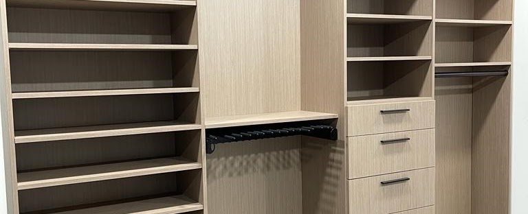 Light oak walk-in closet